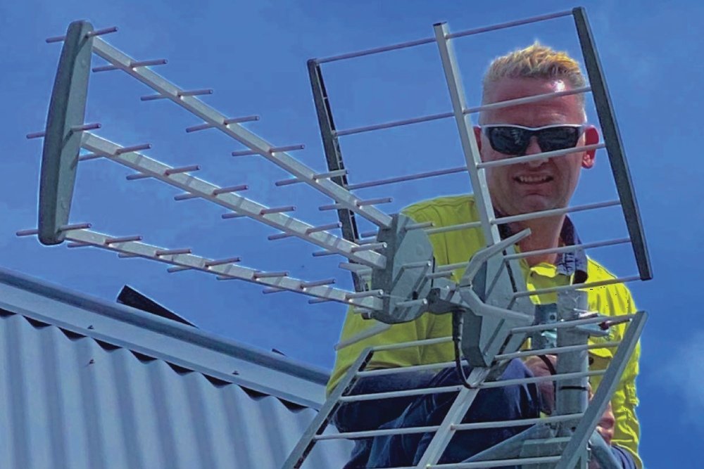 Nigel from South West Antennas installing a new antenna in Yass Valley